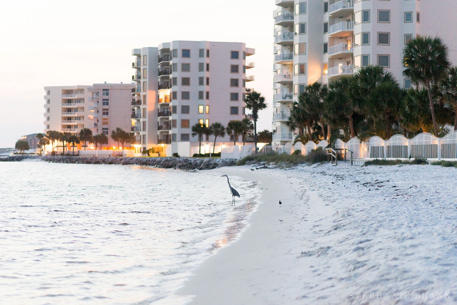 crane-by-the-beach-at-sunset-at-the-jetties-in-destin-florida