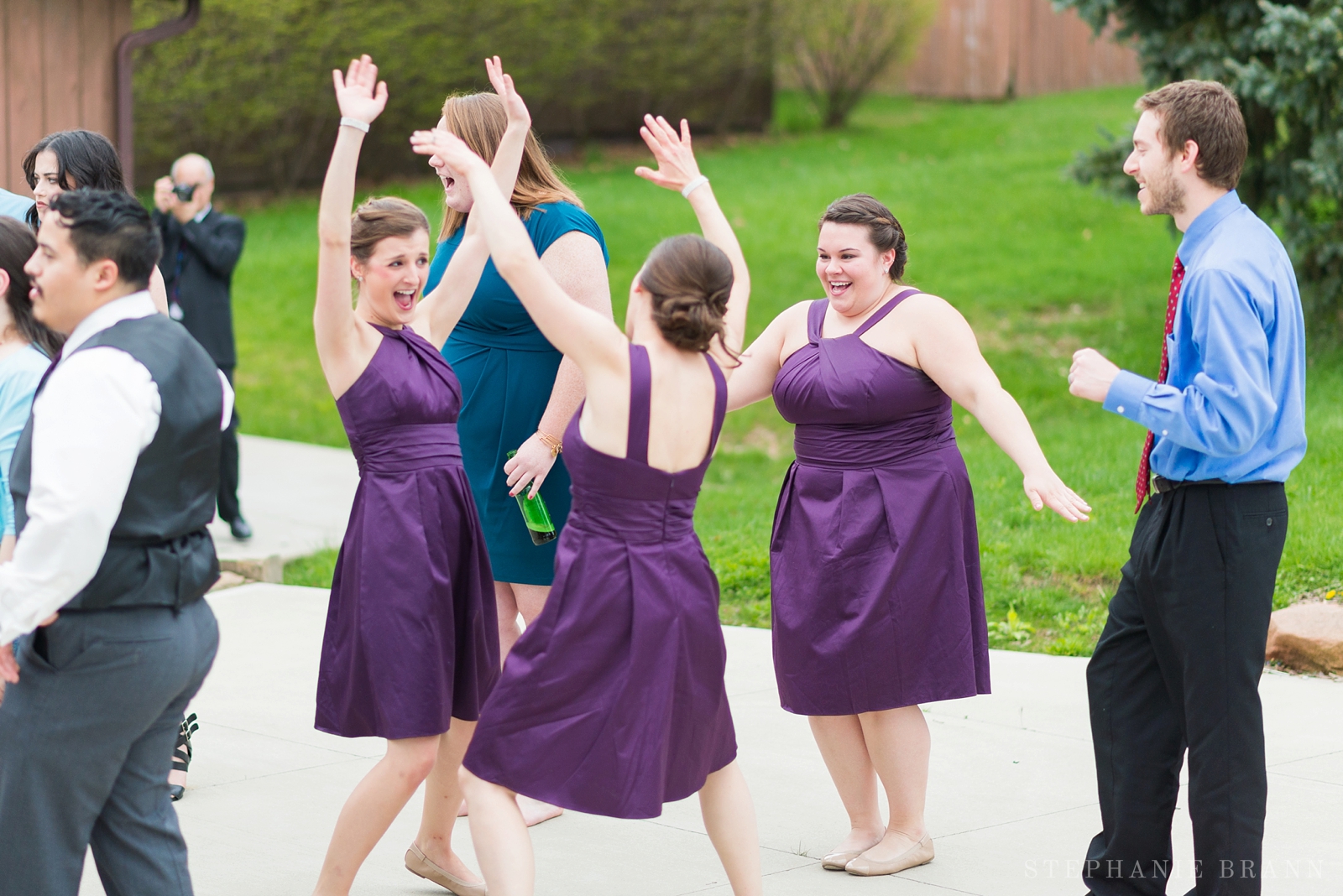 bridesmaids dancing and having fun