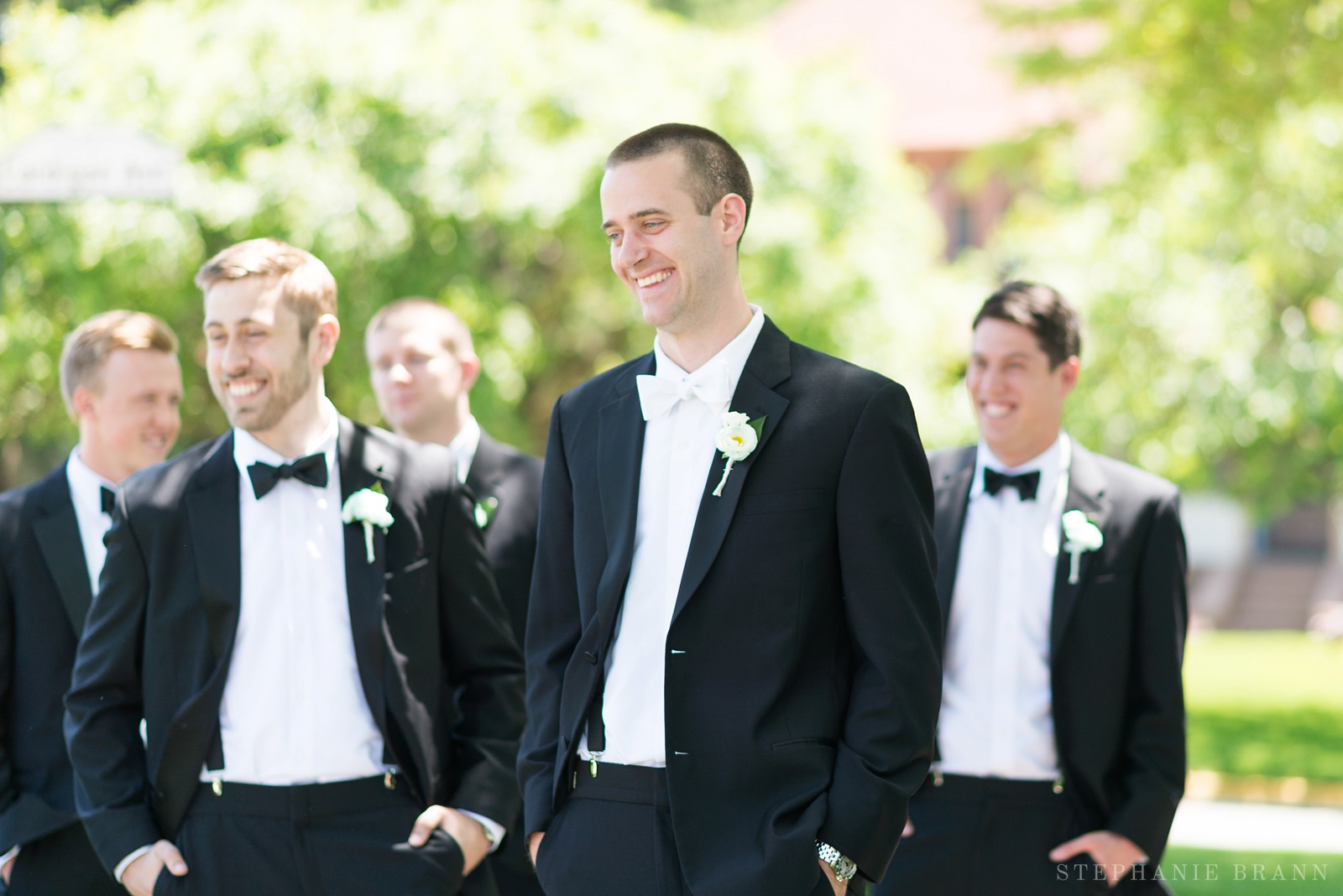 close-up-portrait-of-a-groom-in-a-black-tux