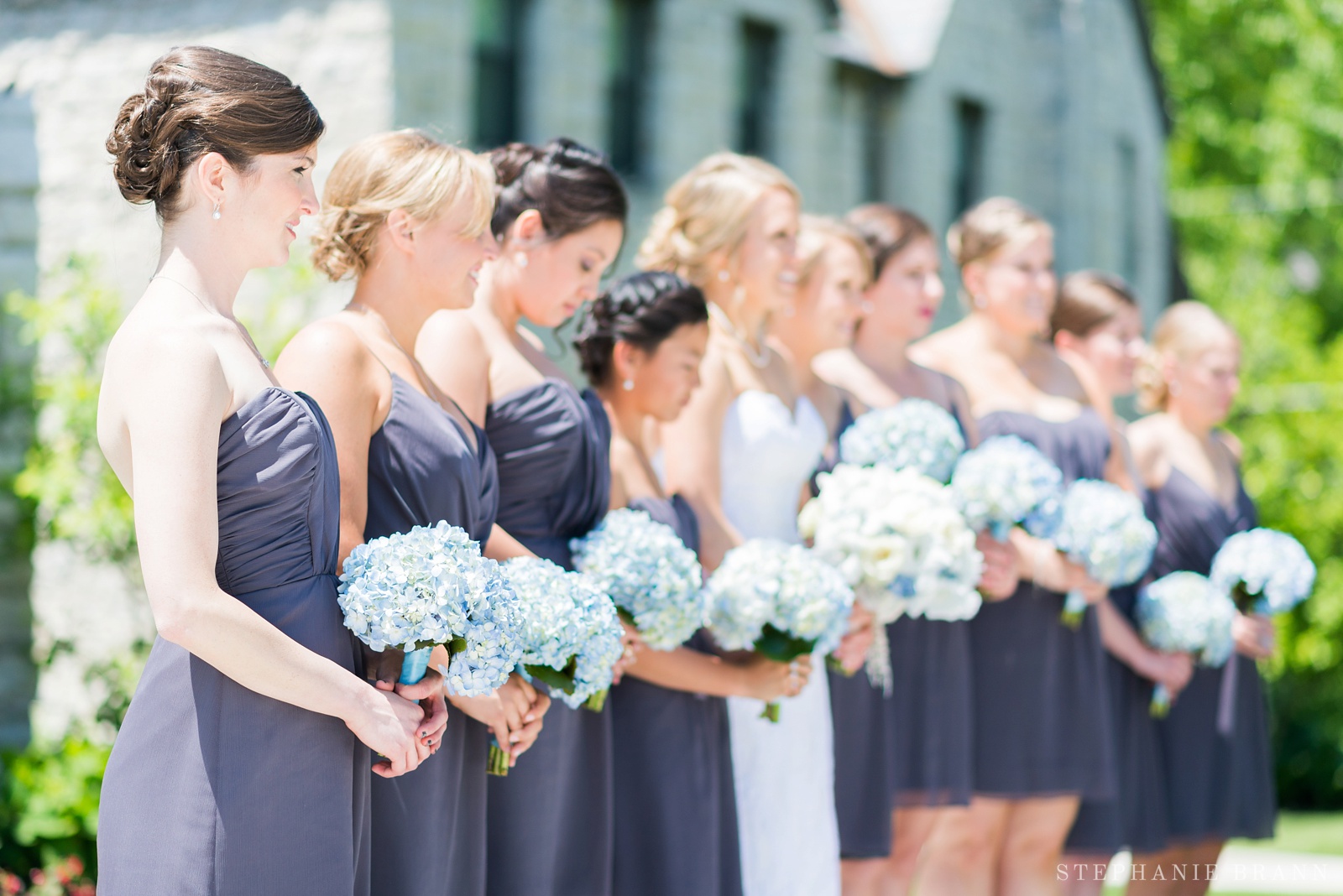 up-close-of-a-row-of-bridesmaids-bouquets