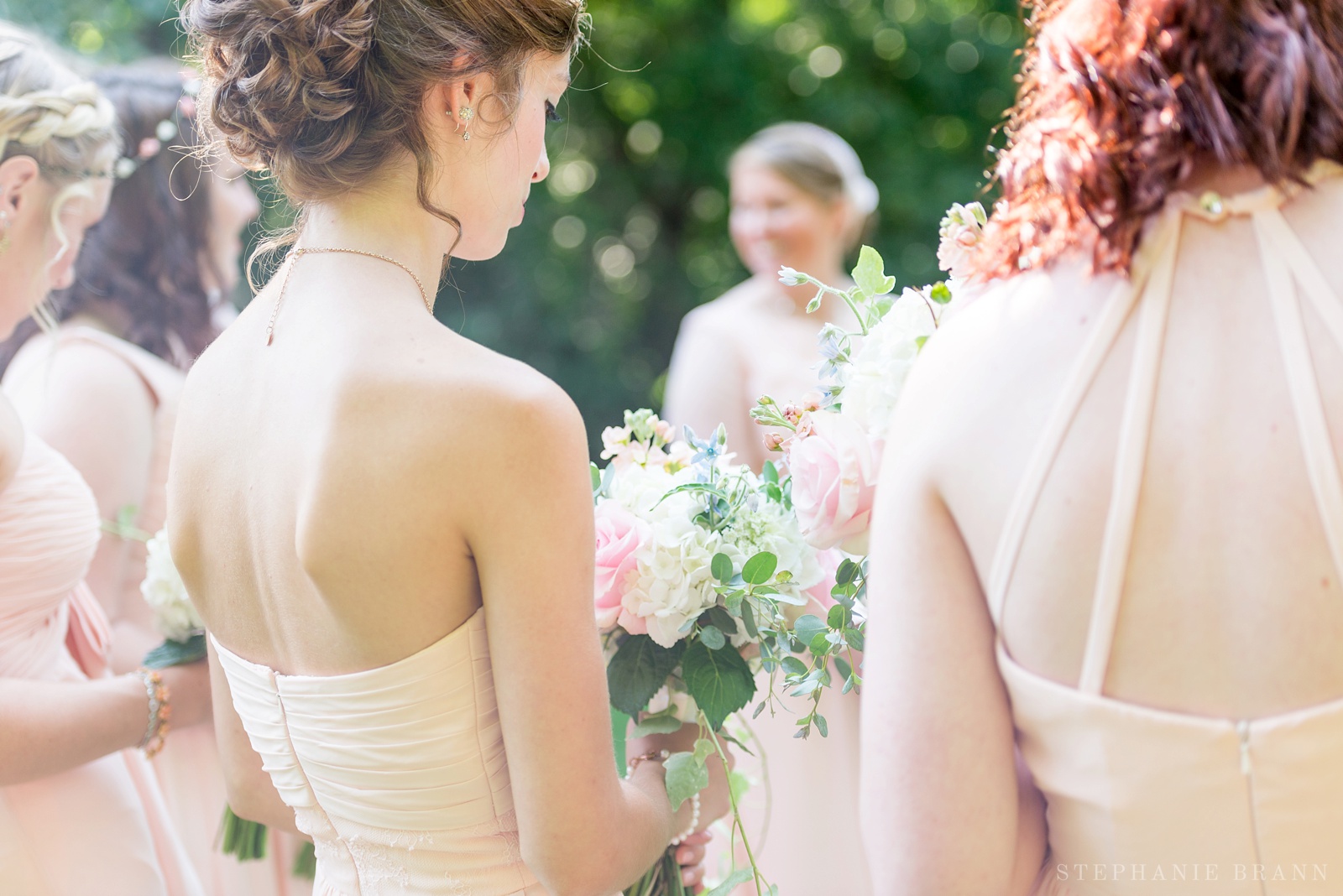 wedding-details-of-the-bridesmaids-flowers-outdoors