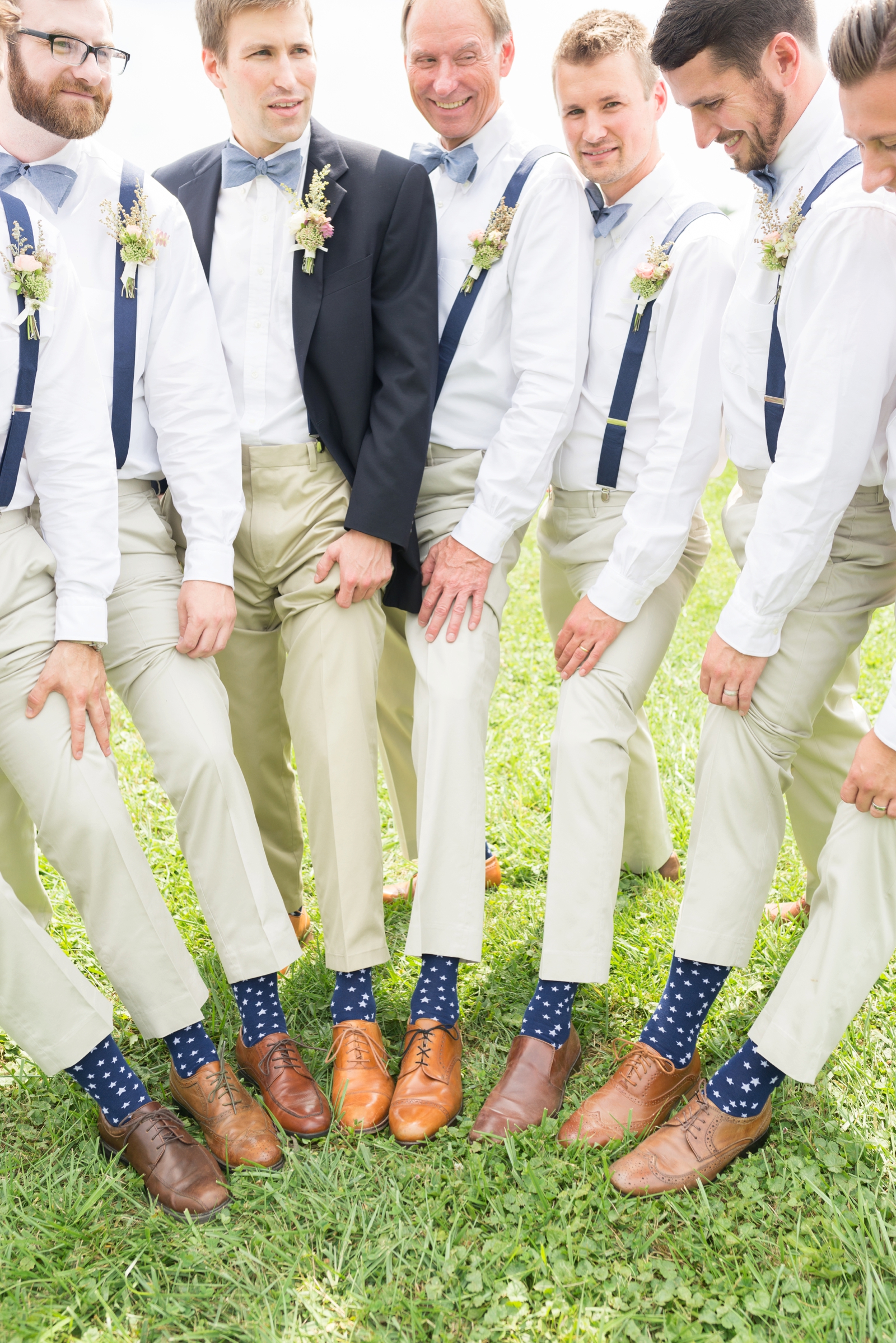 guys-showing-their-blue-polka-dot-socks