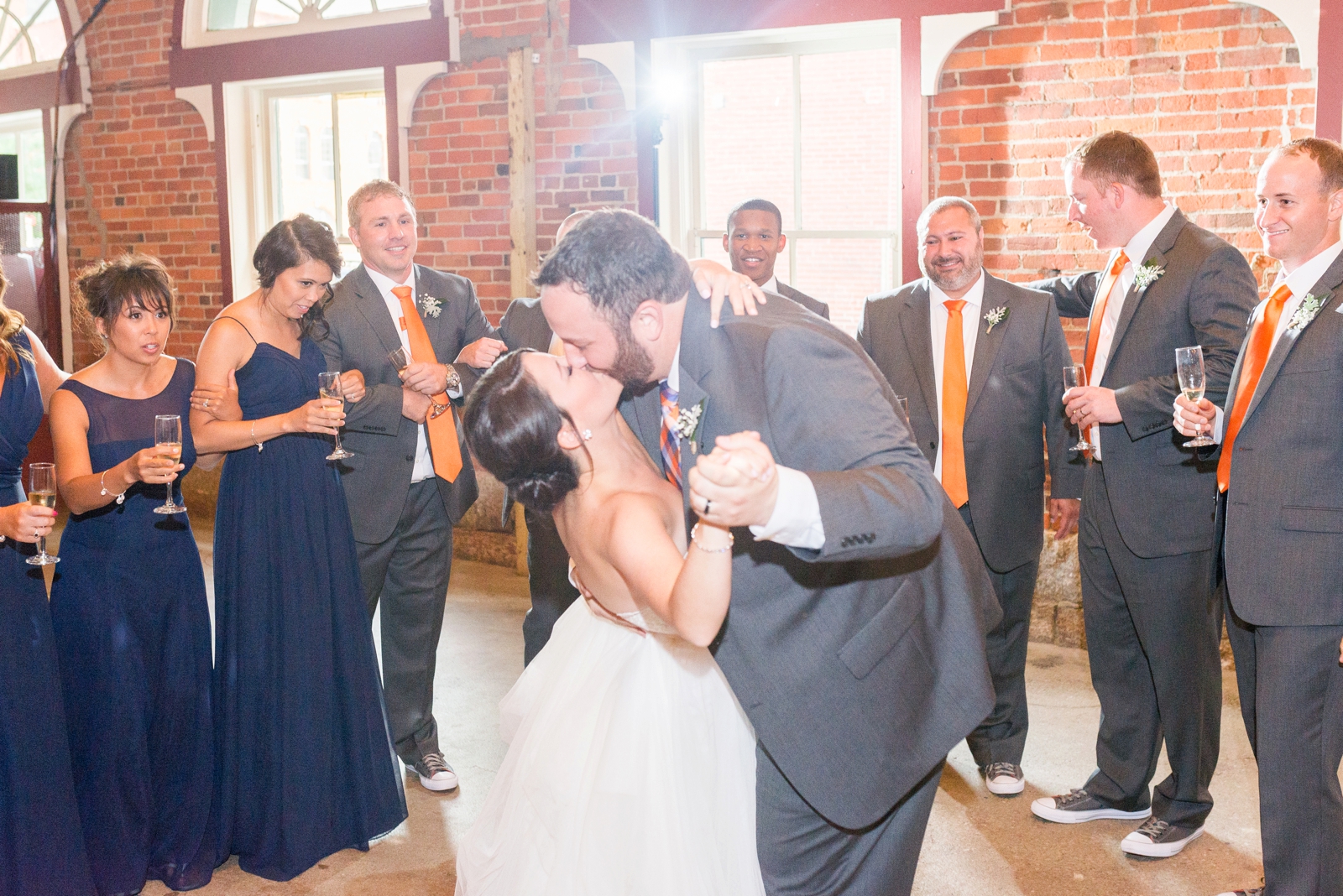 spontaneous-dip-and-kiss-at-a-wedding