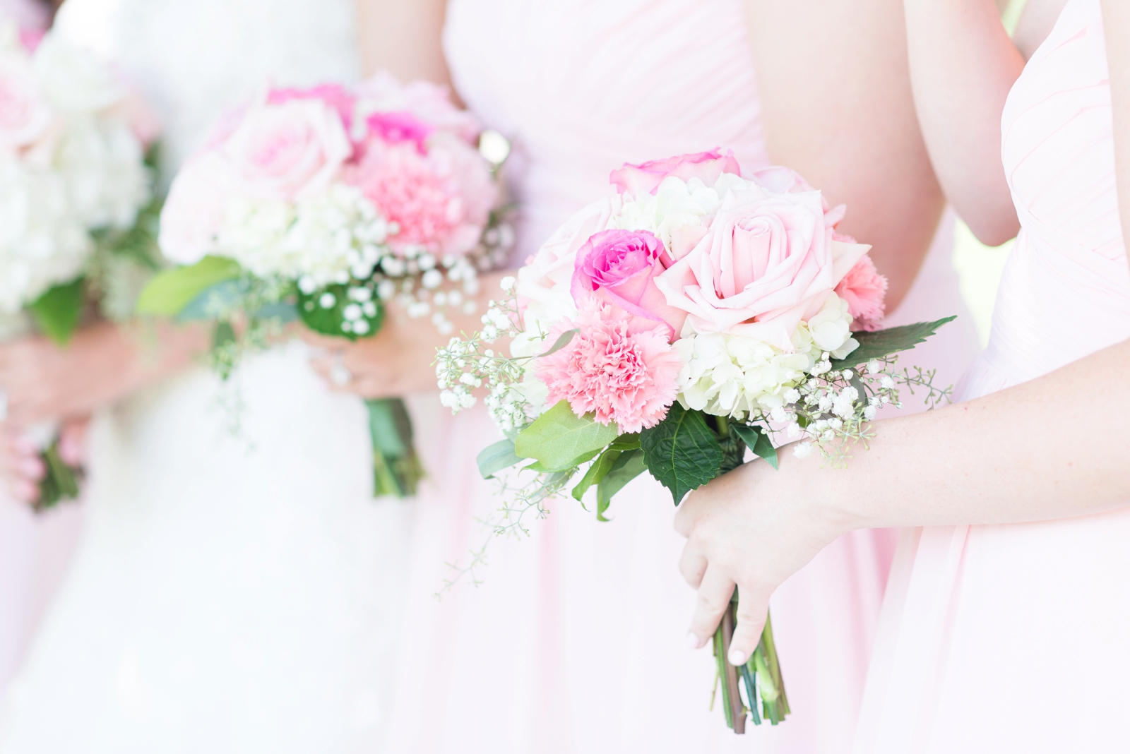 baby-light-pink-and-white-wedding-flowers-and-bridesmaids-dresses
