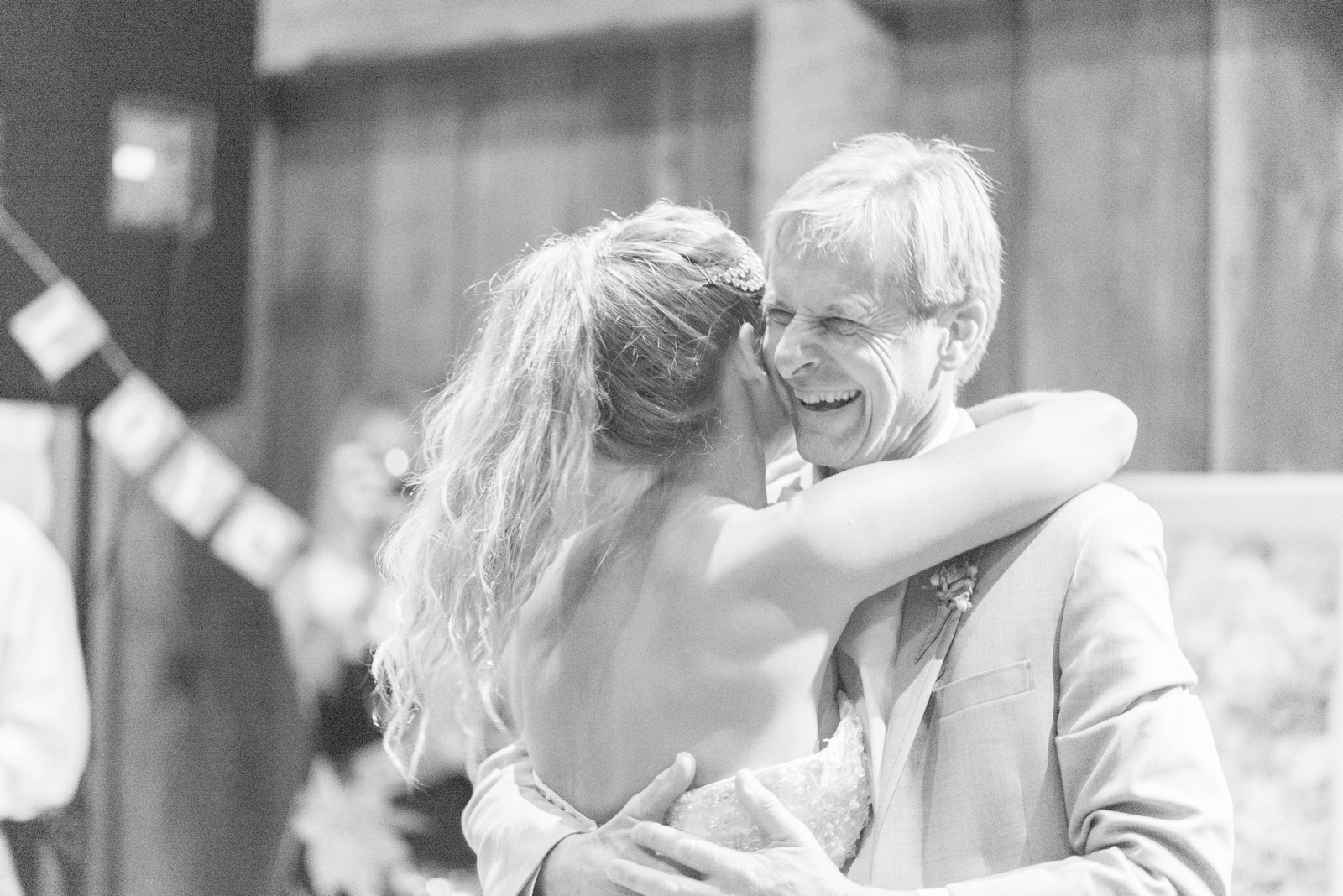 dad-laughing-during-the-reception-dance