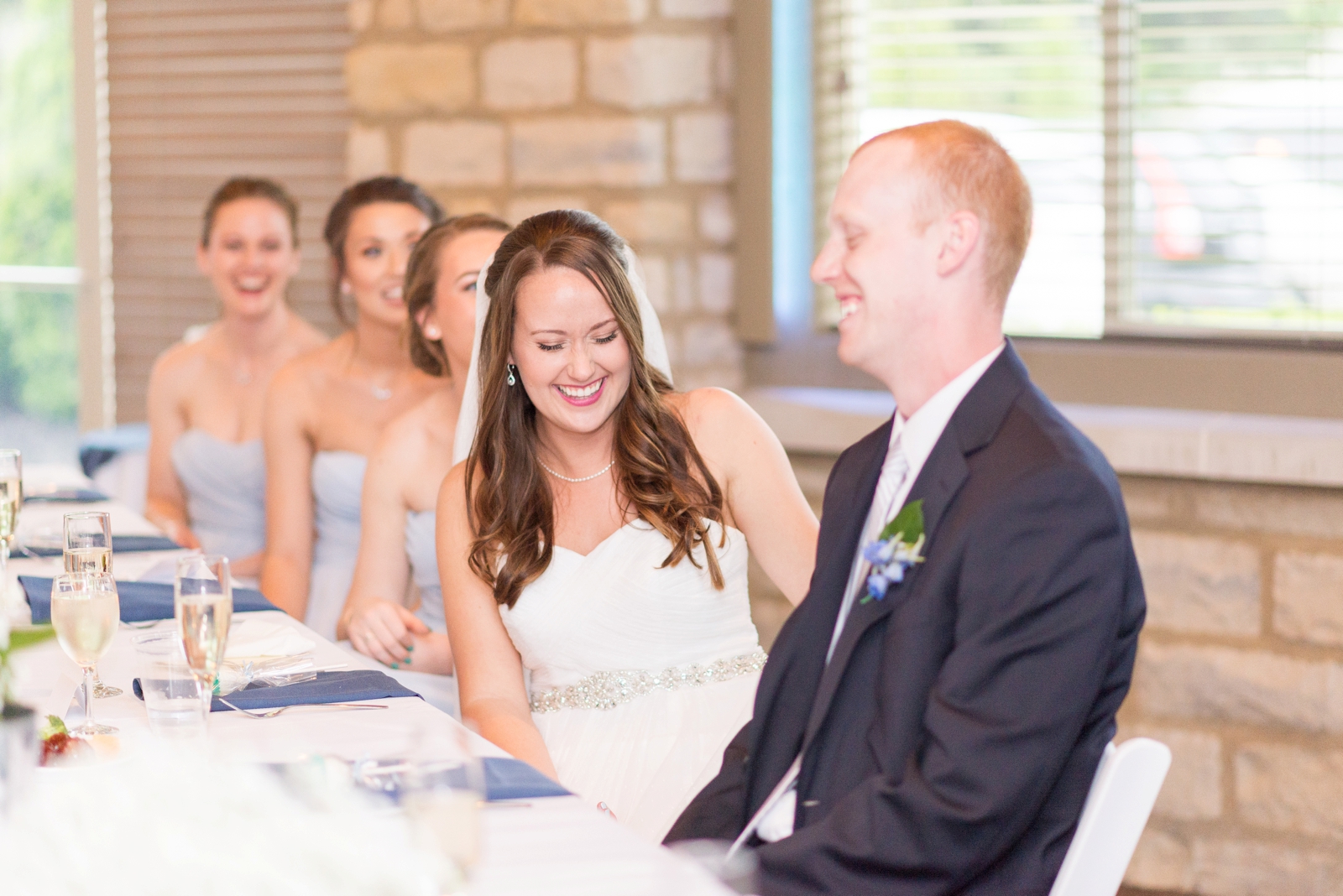 bride-and-groom-laughing-at-their-friends