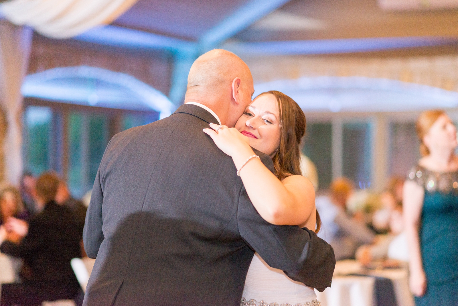 bride-and-father-hugging-after-dancing
