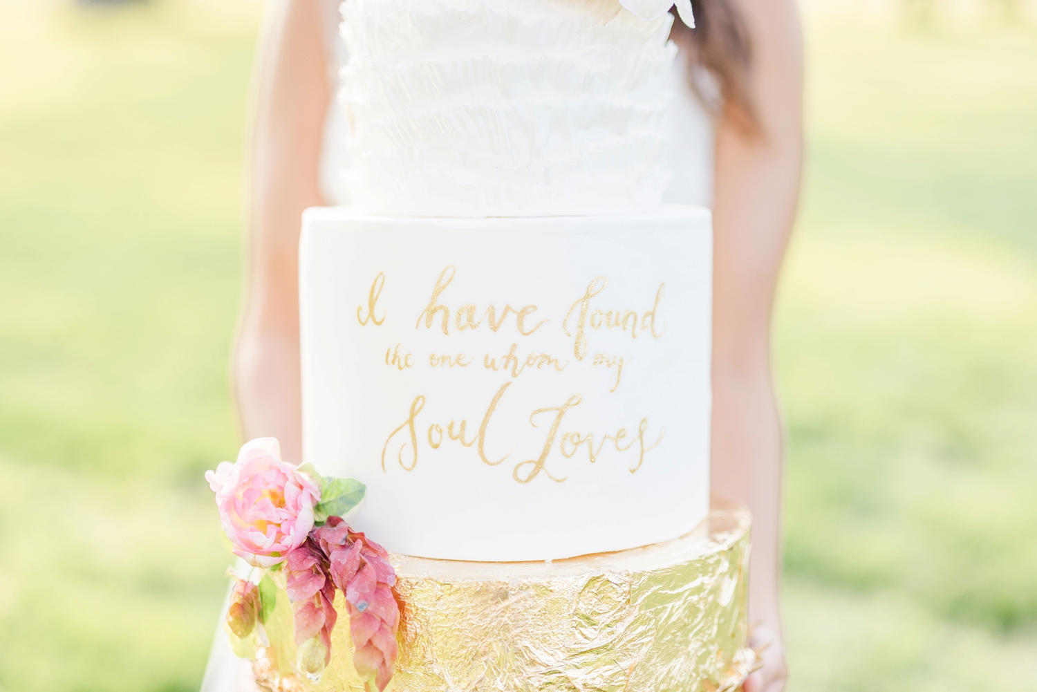 gold-writing-on-a-wedding-cake