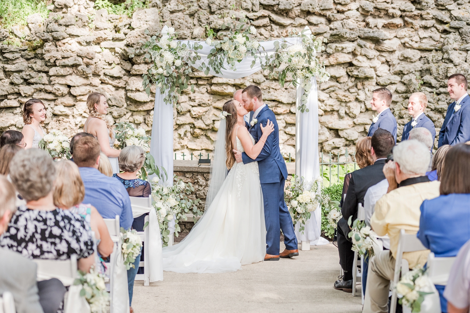 first-kiss-at-the-grotto-at-nazareth-hall-in-toledo-ohio