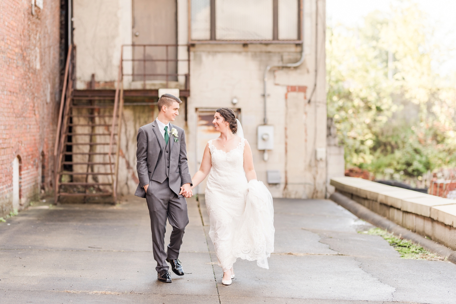 married-couple-standing-in-an-alleyway-in-downtown-mansfield