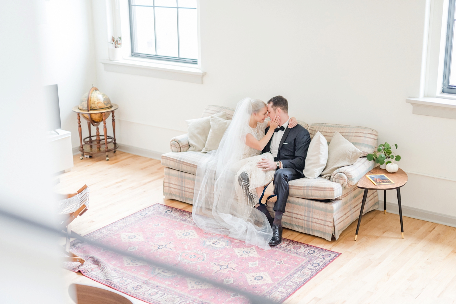 in-home-lifestyle-portraits-of-a-bride-and-groom-on-their-wedding-day
