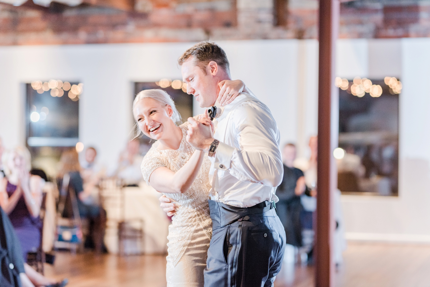 couple-smiling-and-laughing-during-their-first-dance