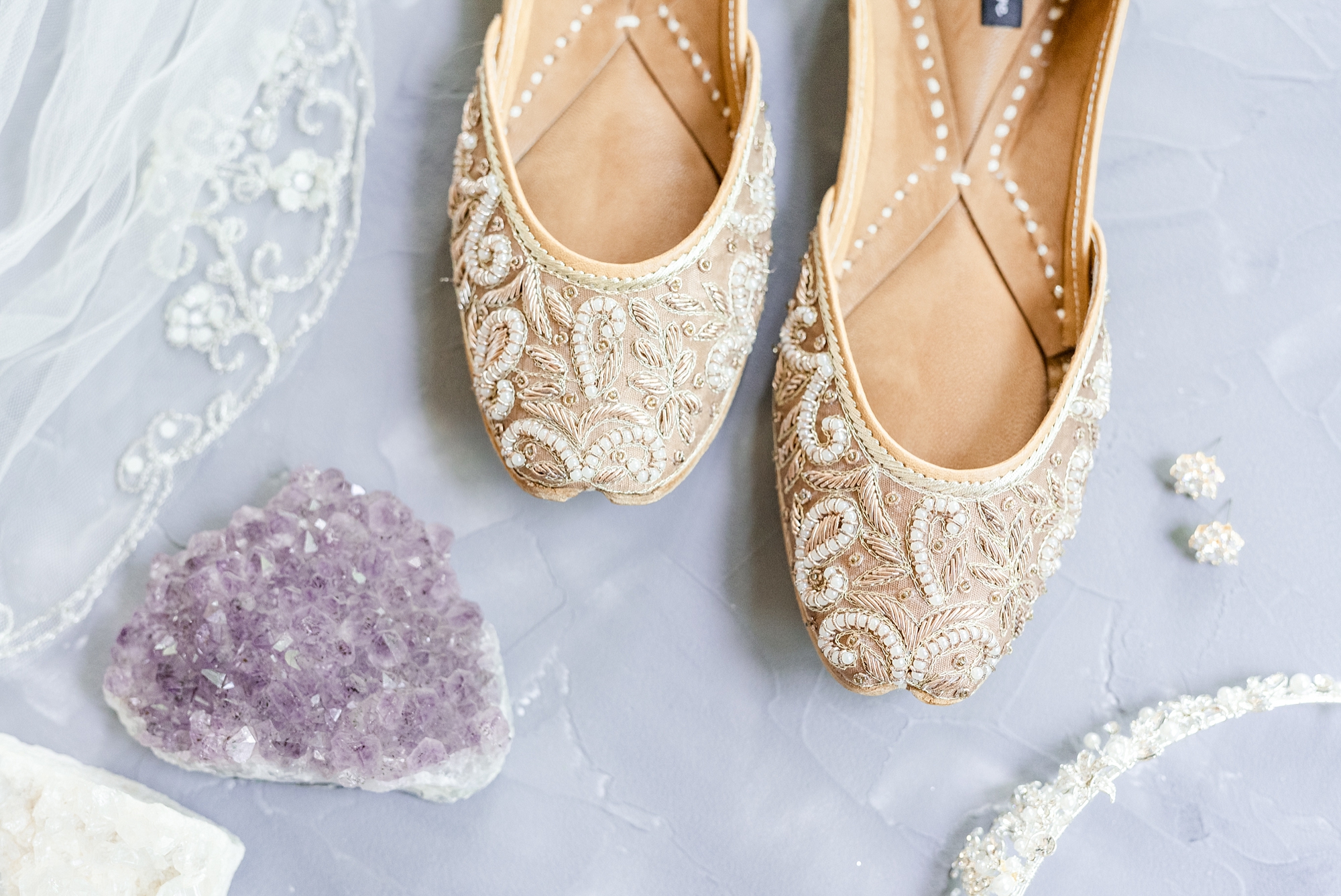 bride's lace flats by purple flowers