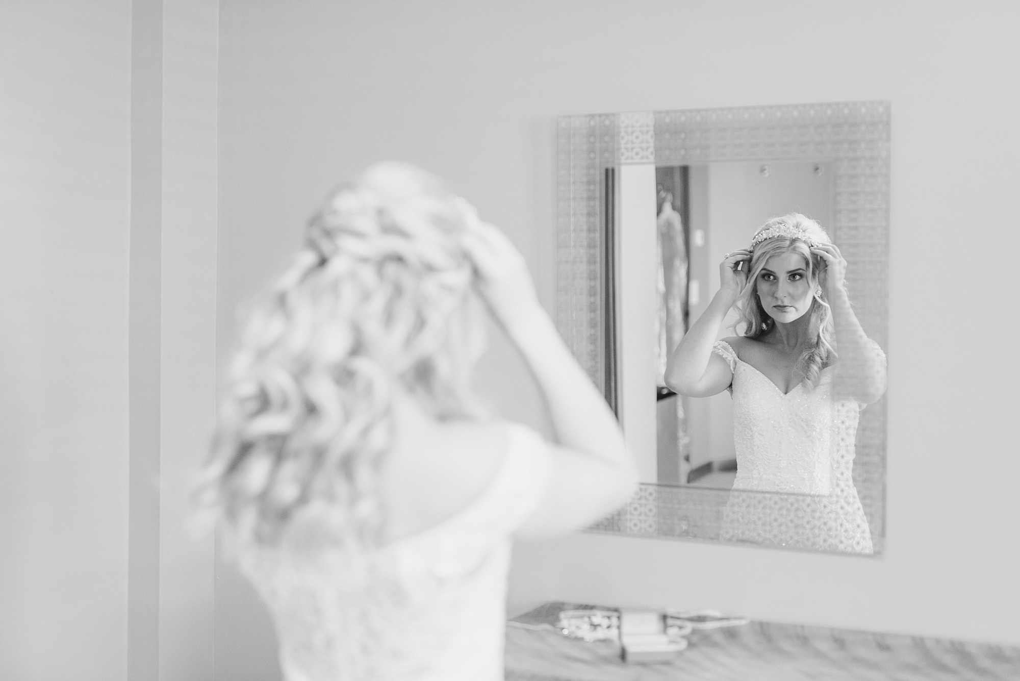 Stephanie Kase Photography photographs bride adjusting hair before Ohio wedding