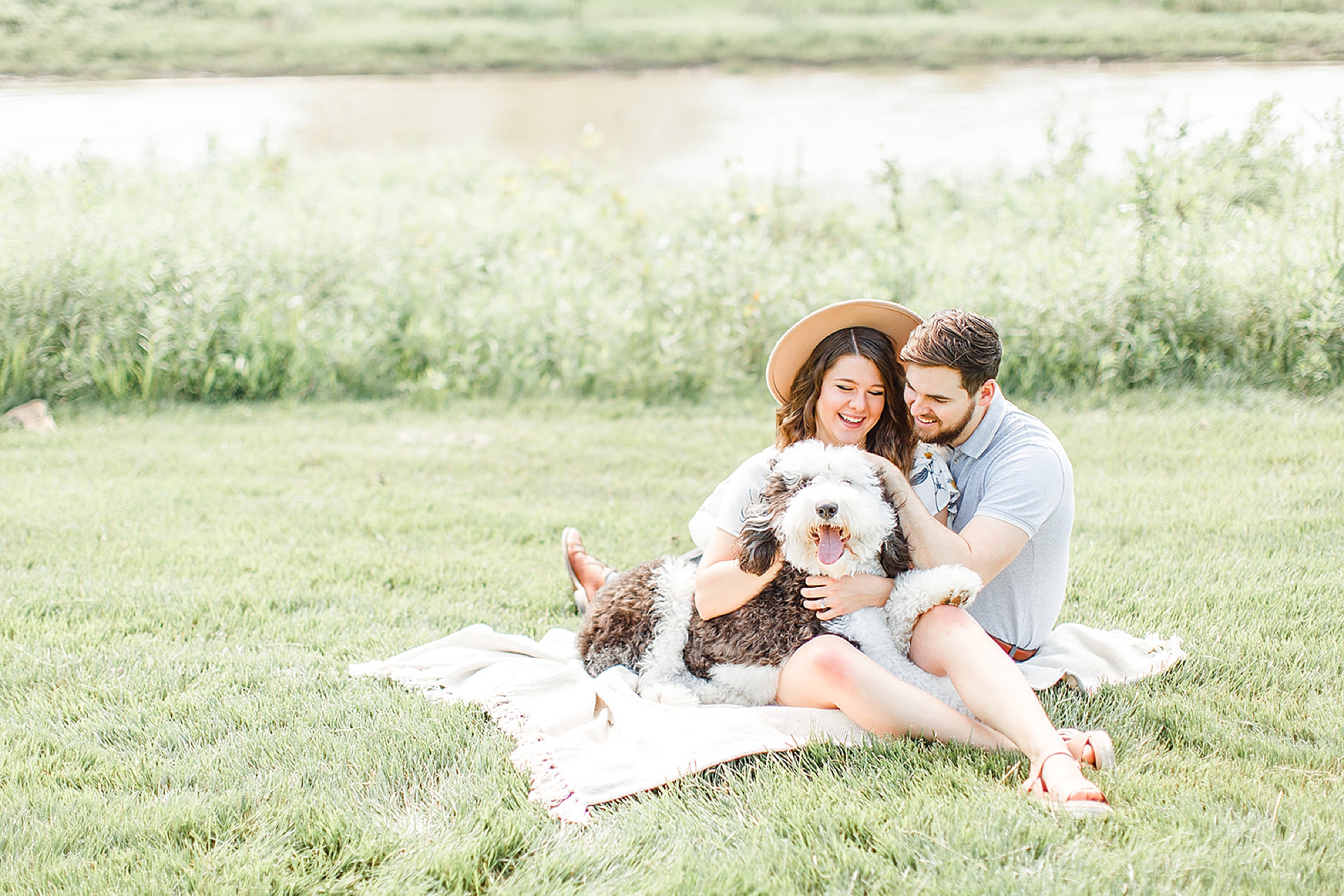 Ohio family poses on blanket with dog for third anniversary photos