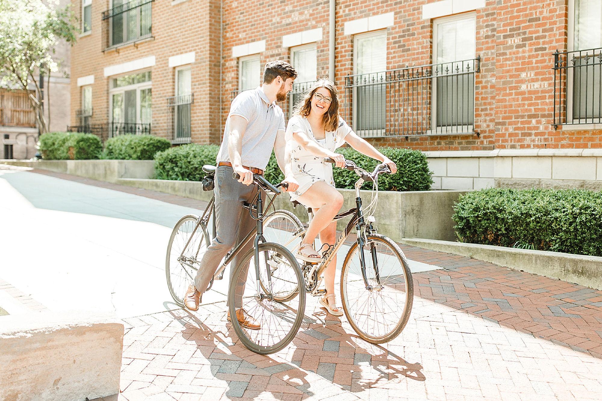 married couple rides bikes in Ohio during third anniversary photos