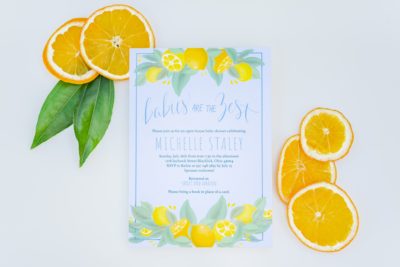 backyard baby shower with citrus and dusty blue theme