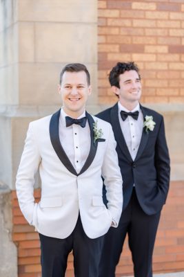 groom and groomsman pose in Canton OH