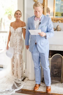 bride and groom read ceremony vows privately before GA wedding