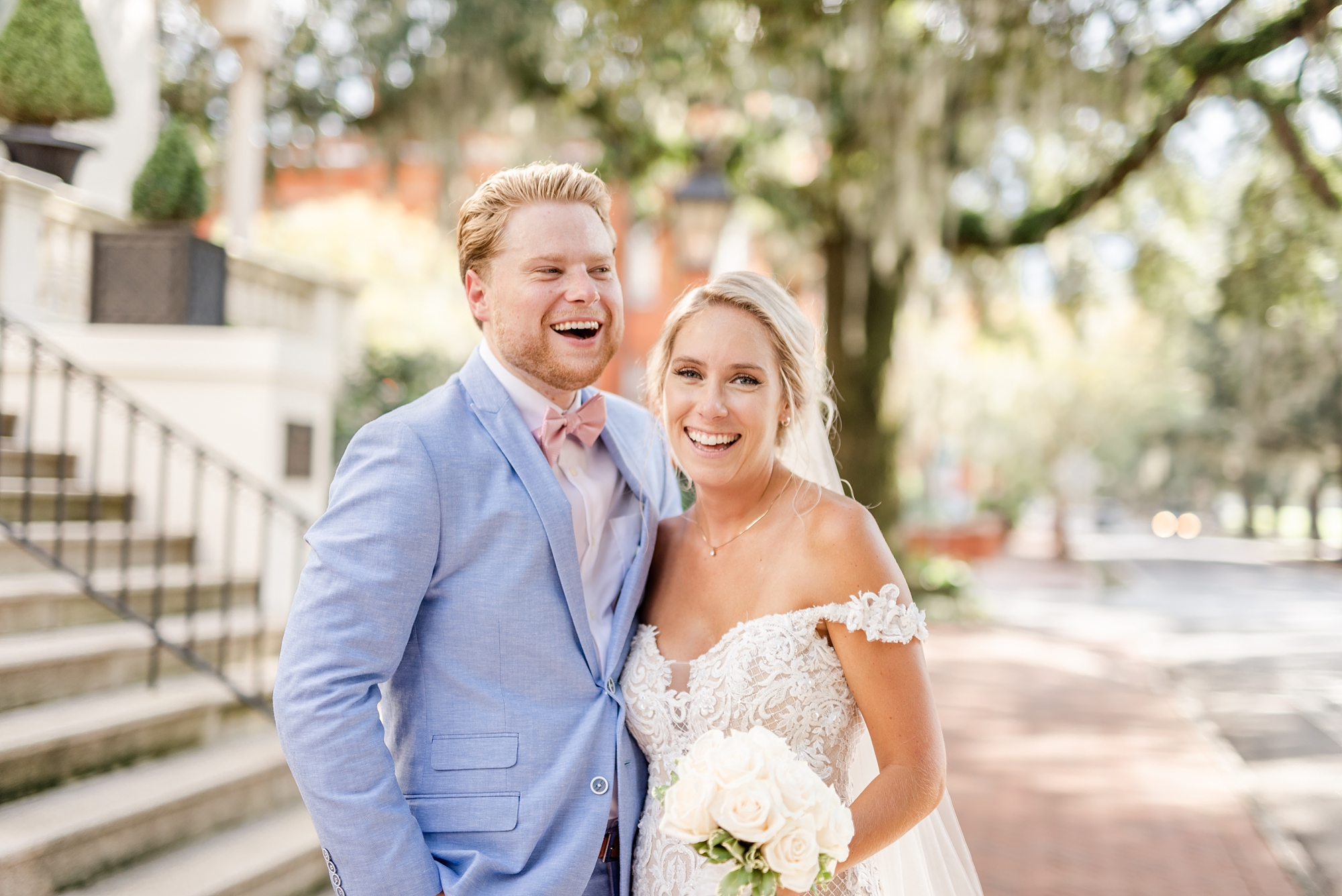 bride and groom laugh during GA wedding photos