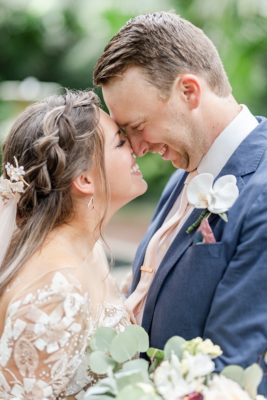 newlyweds touch noses during Ohio wedding photos