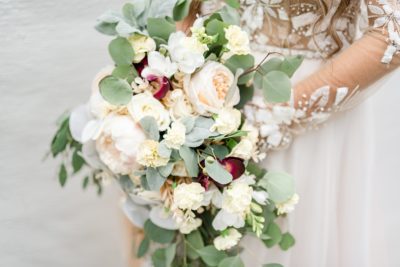 bride's peach and pastel floral bouquet