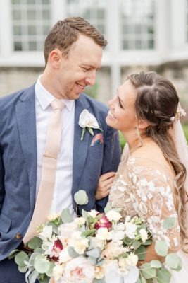 Ohio bride and groom smile during wedding photos