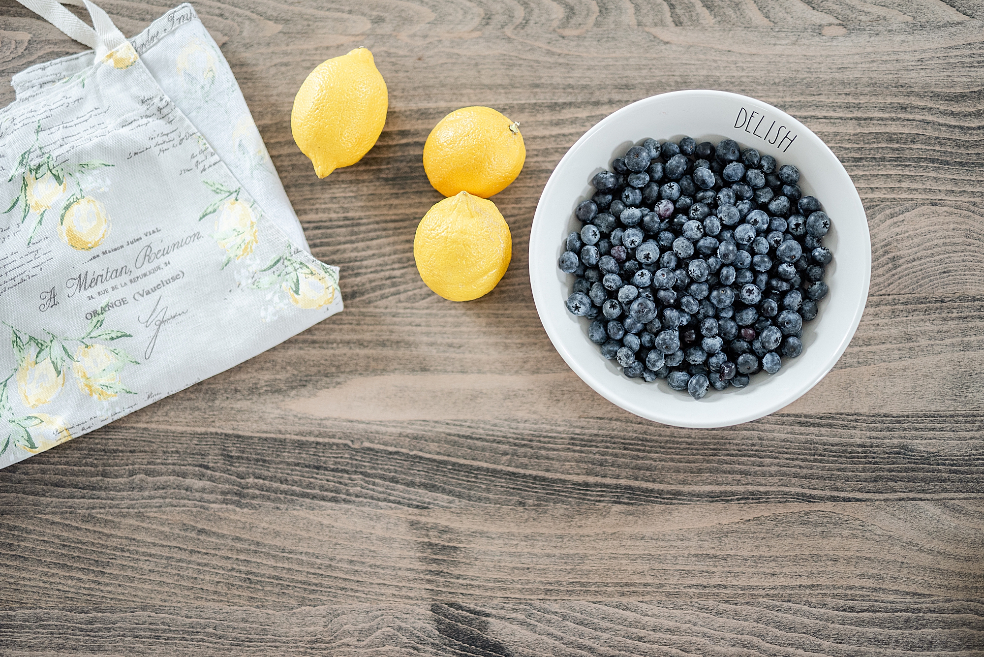 flat lay with lemons and blueberries