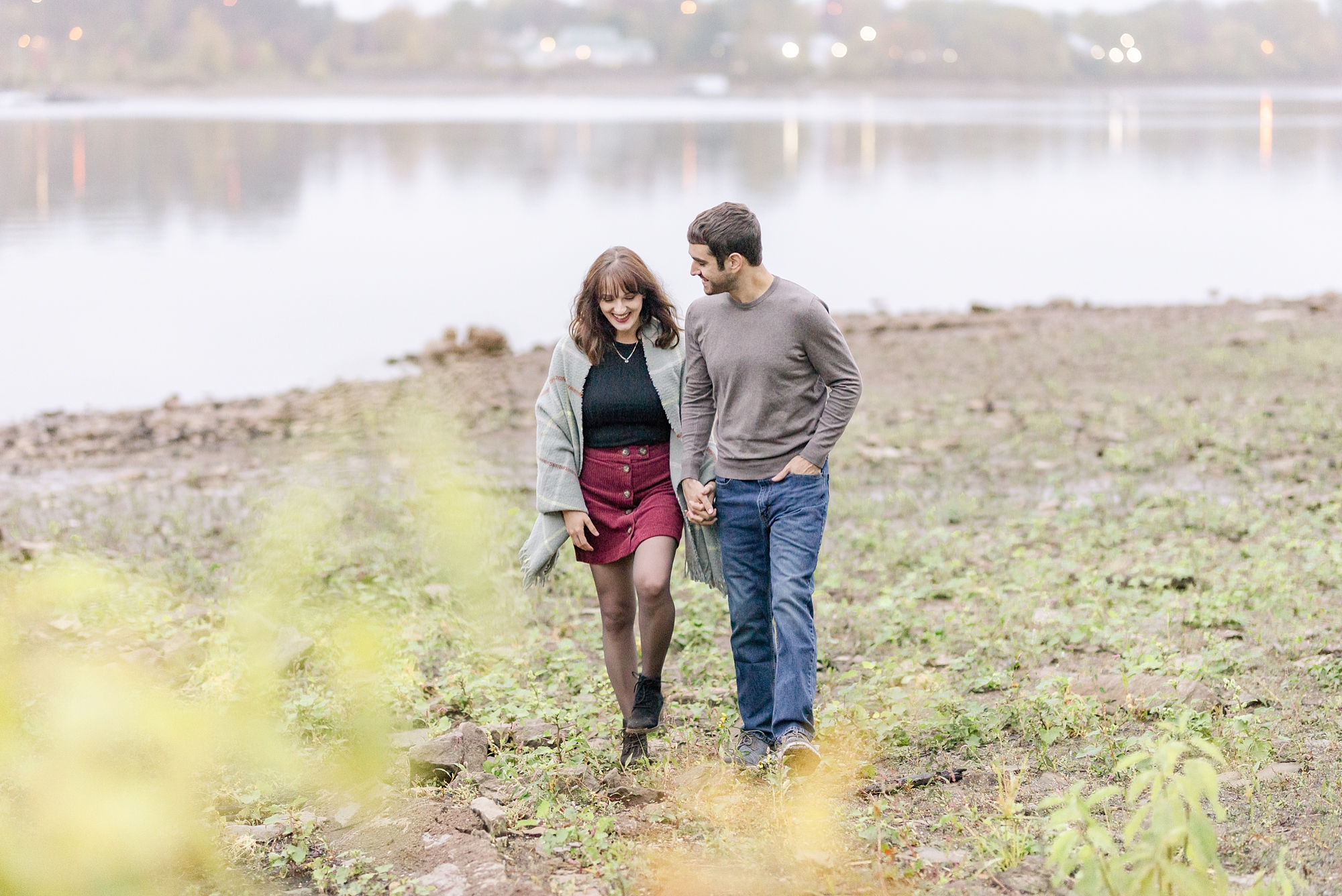 couple walks along lake with Stephanie Kase Photography