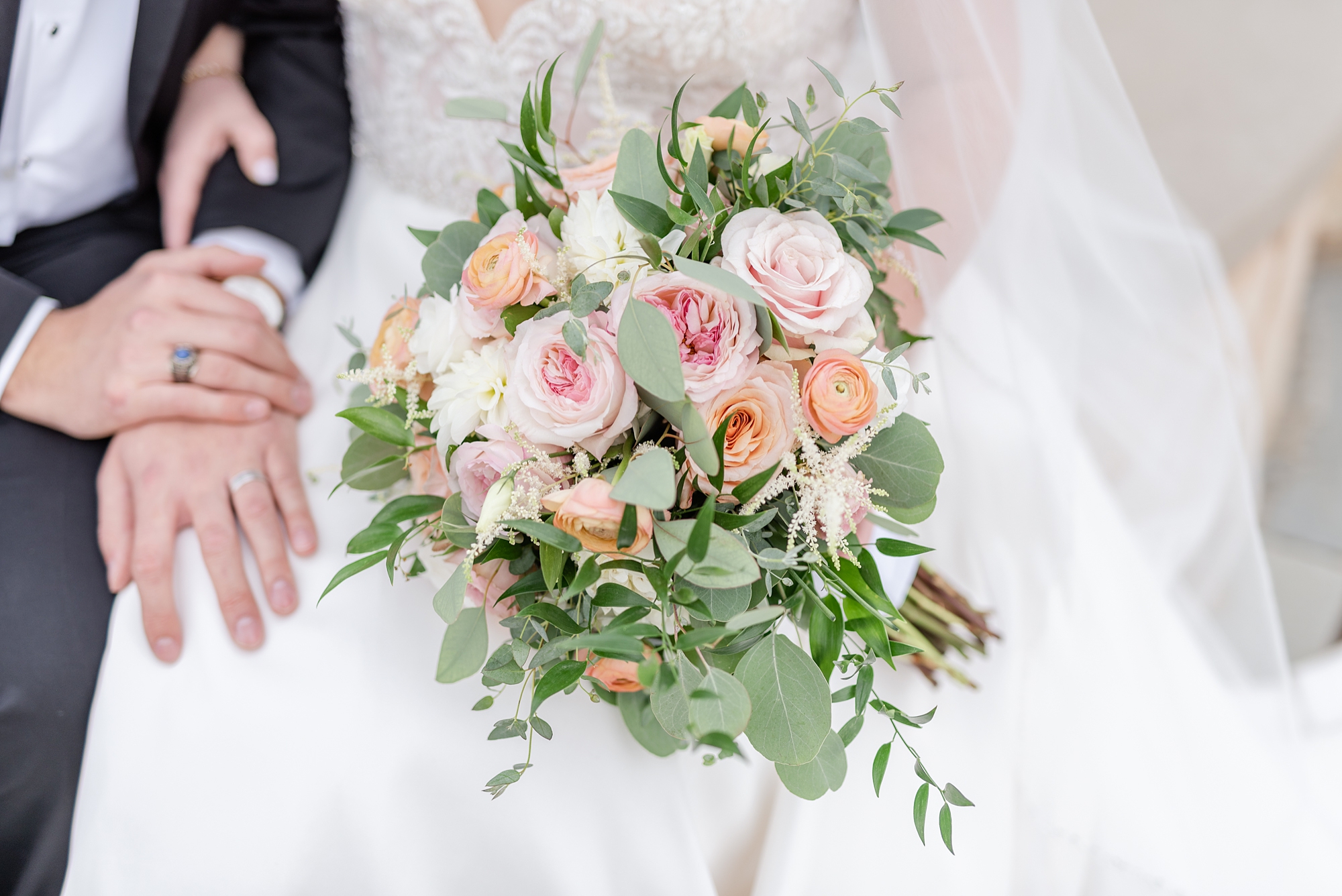 bride's bouquet with pink and orange flowers