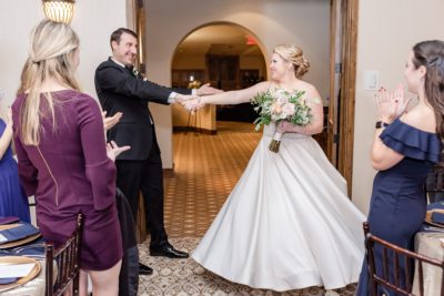 newlyweds enter The Club at Corazon wedding reception