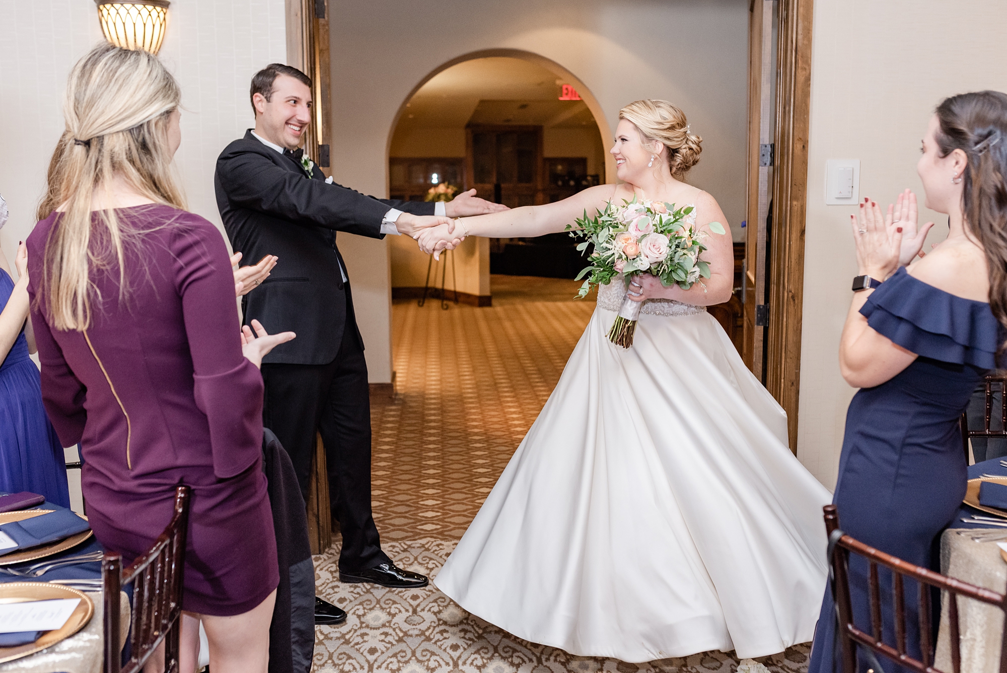 newlyweds enter The Club at Corazon wedding reception