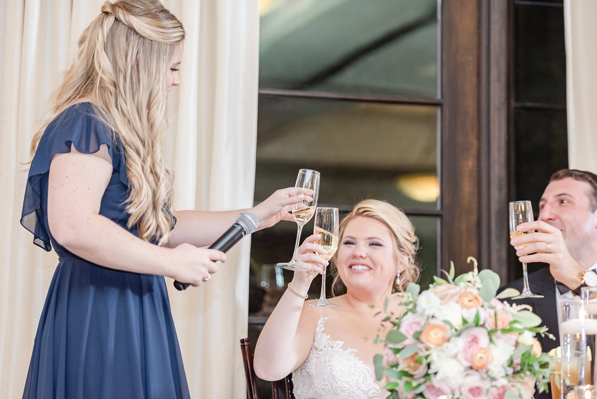 bride toasts maid of honor