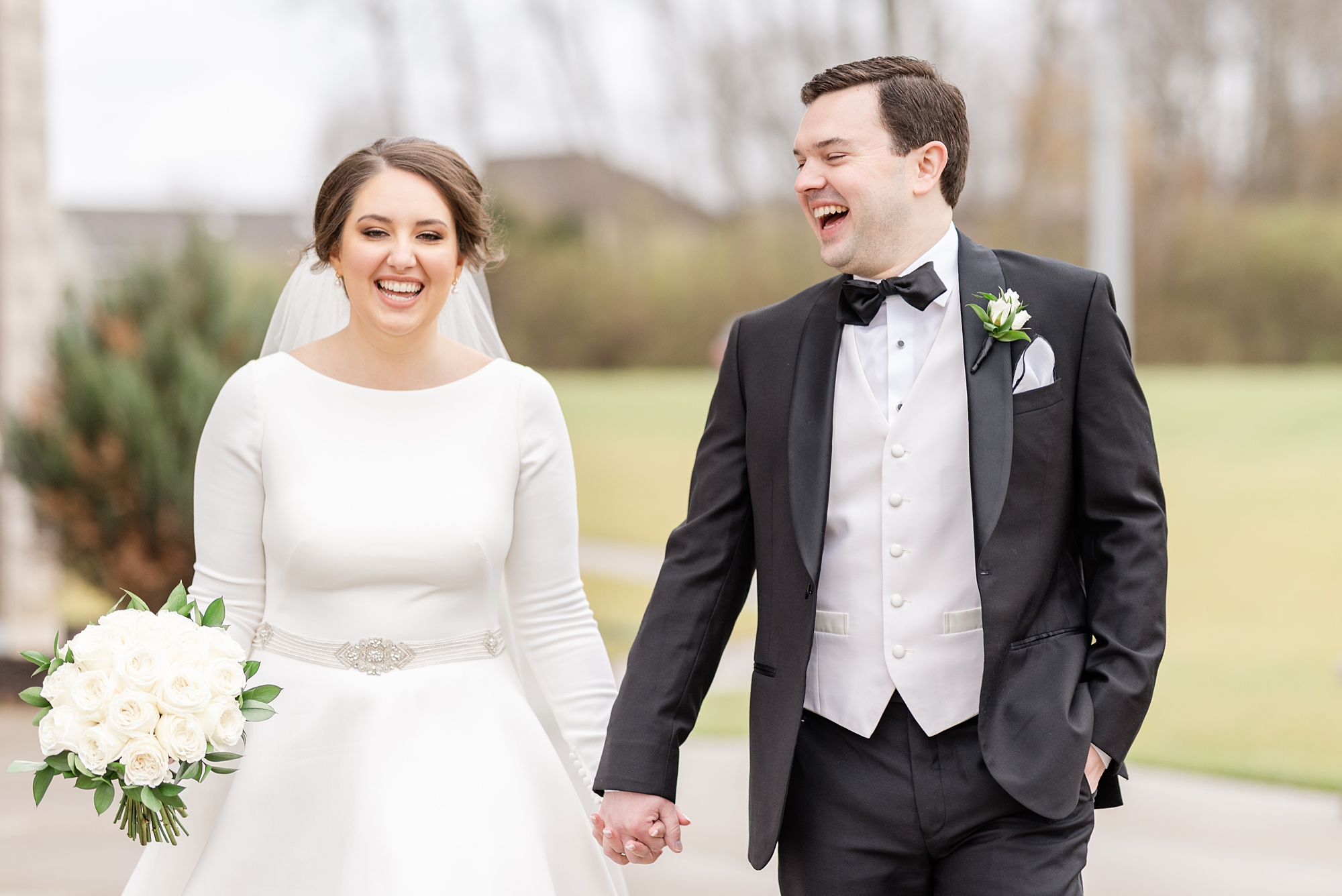 bride and groom walk together before Dayton Ohio wedding