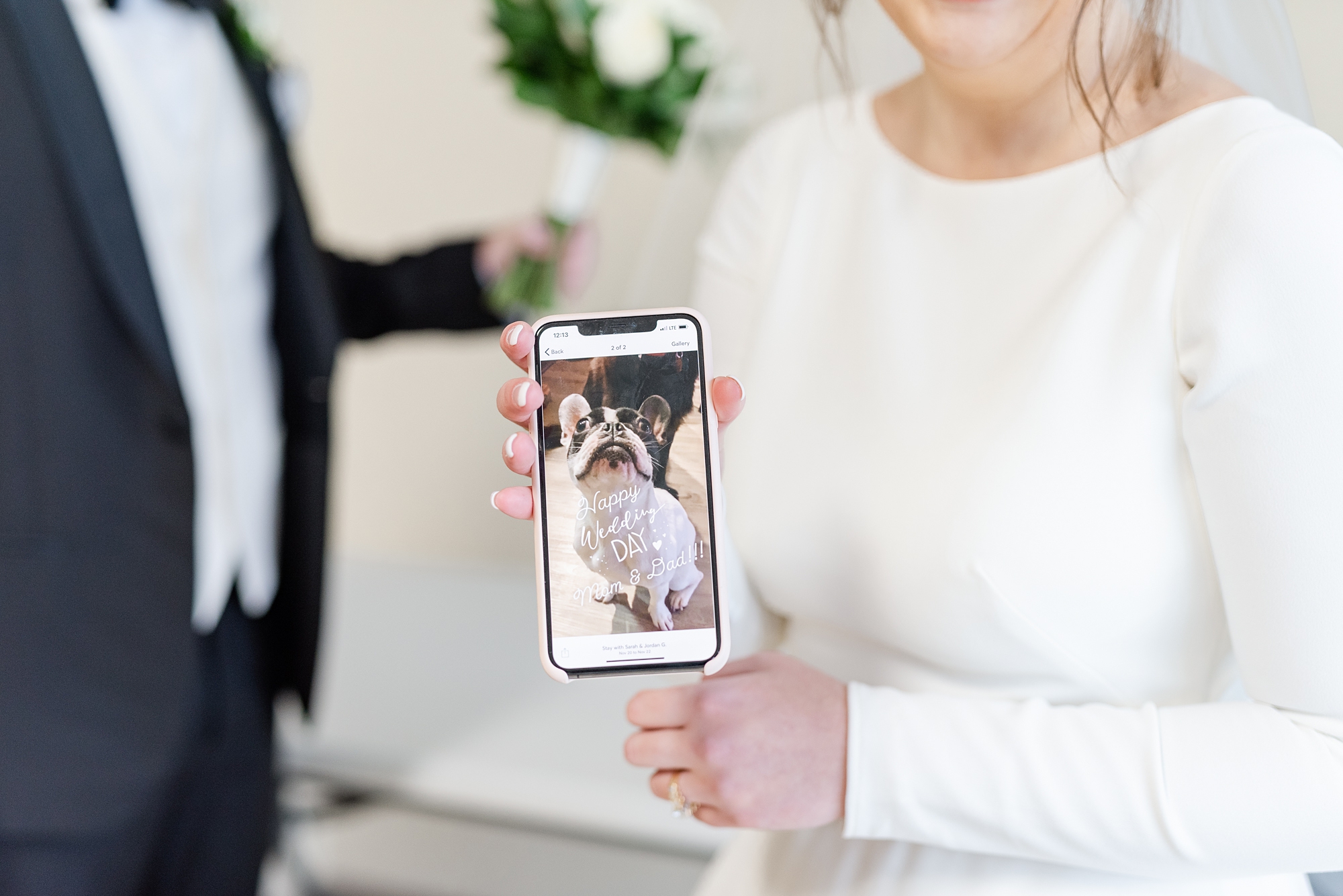 bride shows off message from dog on wedding day