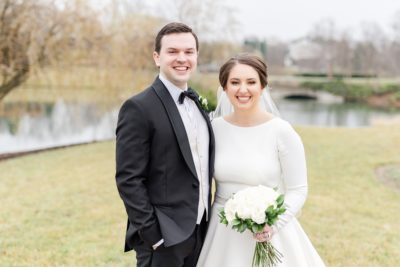 newlyweds pose together during wedding portraits in Ohio