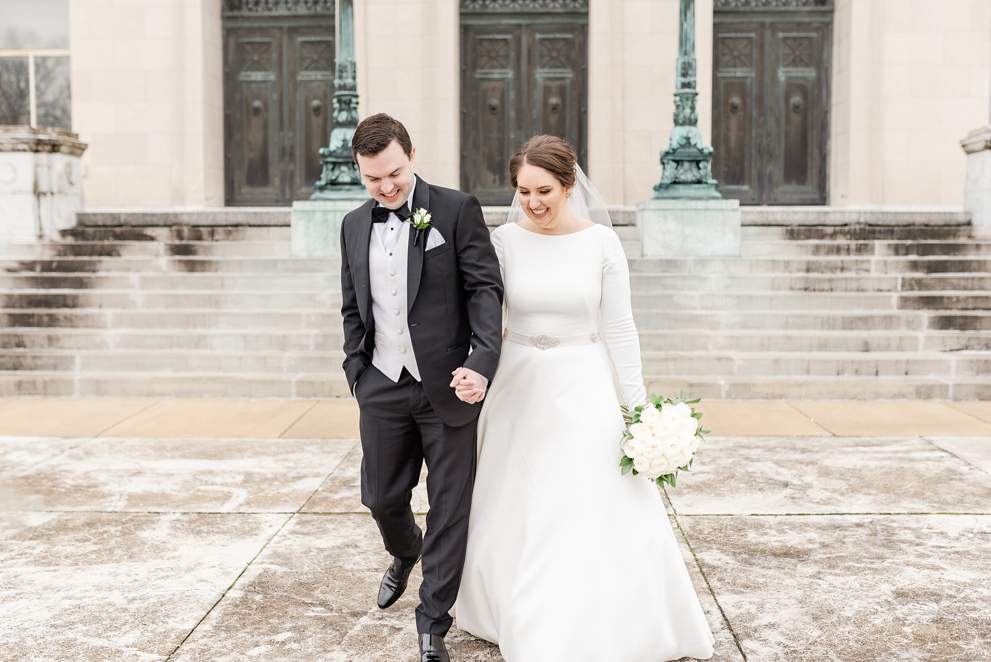 newlyweds walk outside Dayton Masonic Center