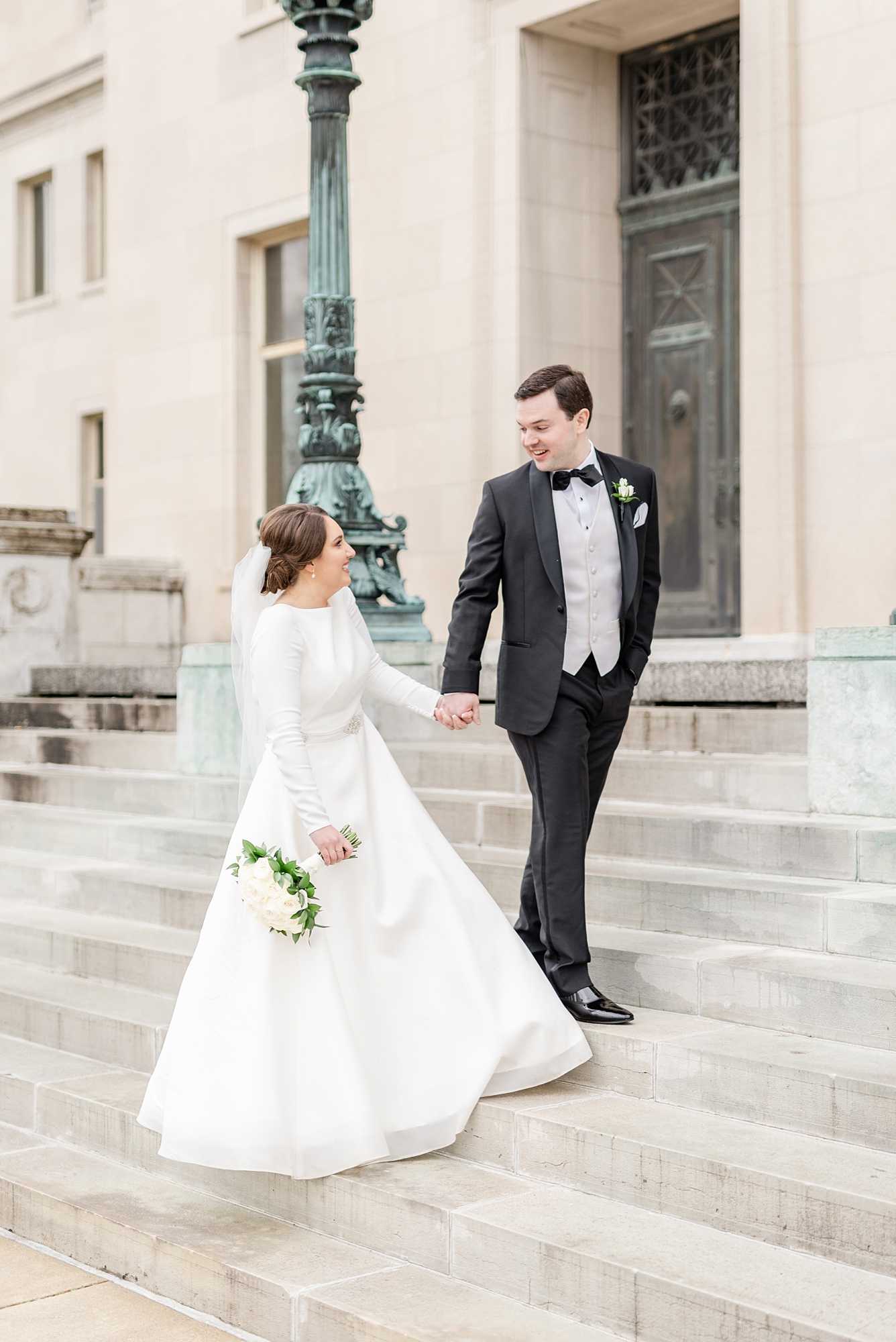newlyweds walk up steps at Dayton Masonic Center
