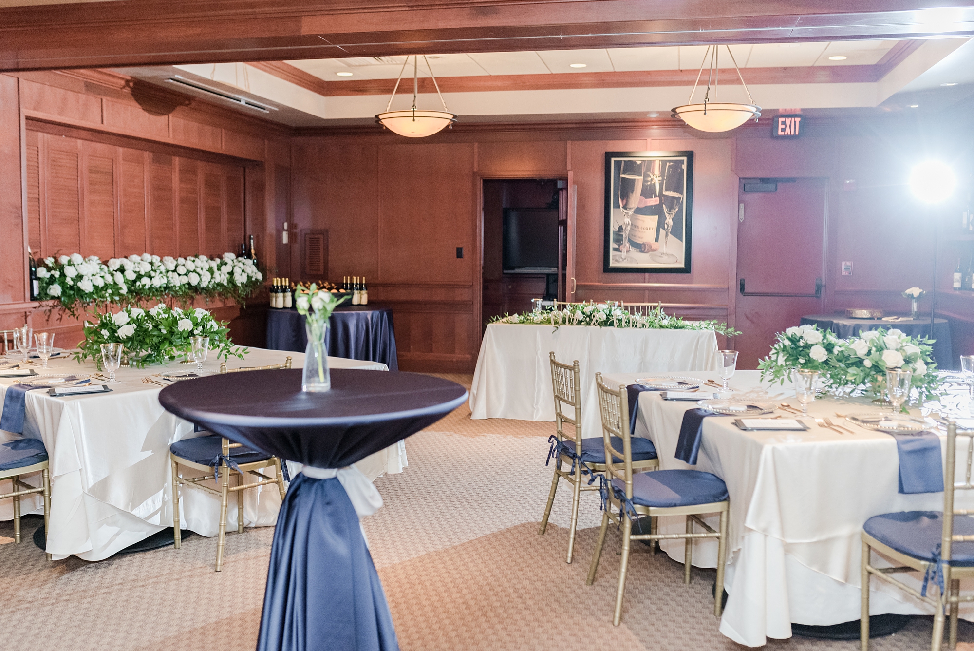 elegant wedding reception with navy and green details