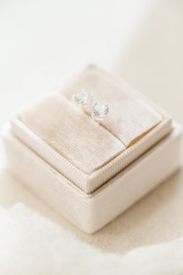 bride's ring in tan ring box