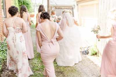 bride and bridesmaids walk in Ohio