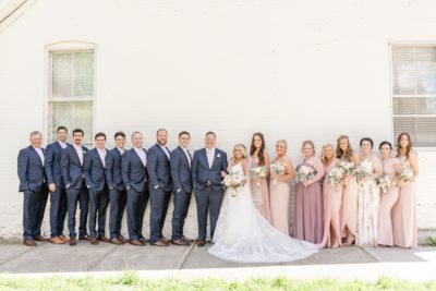 newlyweds pose with Ohio bridal party