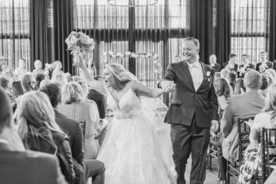 bride and groom cheer after ceremony in Columbus OH