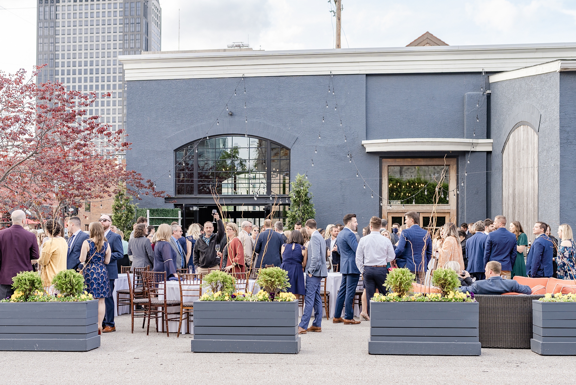 guests mingle during cocktail hour at High Line Car House