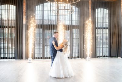bride and groom dance by pyrotechnics
