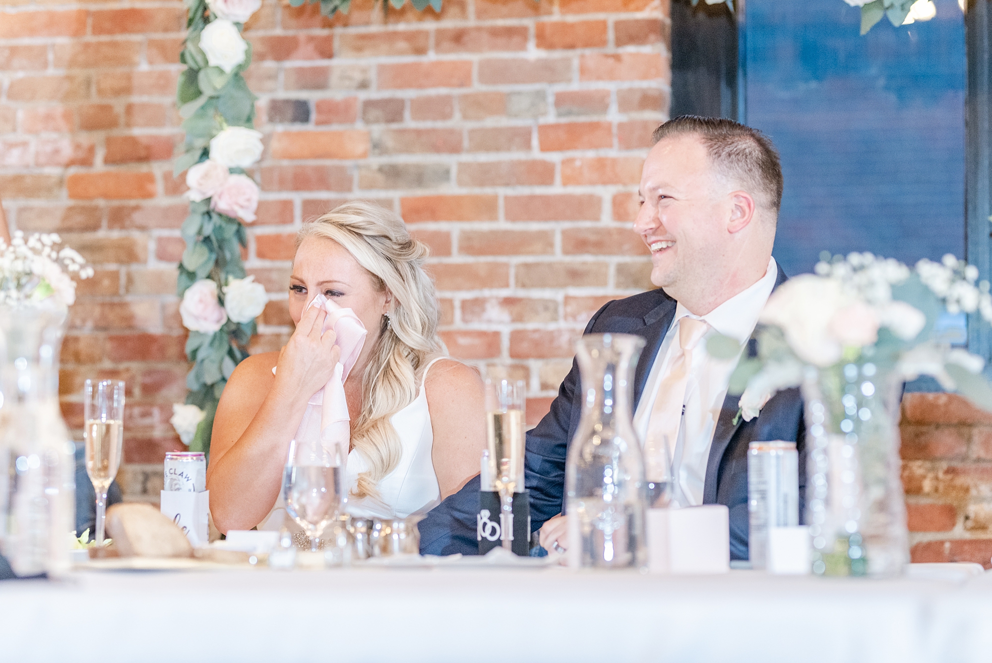 bride cries during toasts at Ohio wedding reception