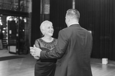 groom and mom dance together during Ohio wedding reception