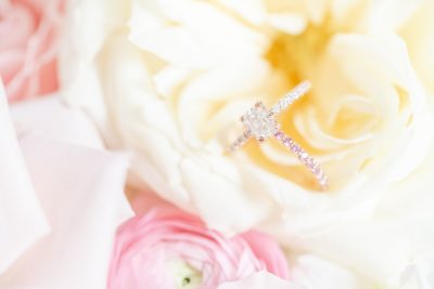 wedding ring sits on yellow flower in Ohio