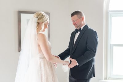 dad has first look with bride on Ohio wedding day