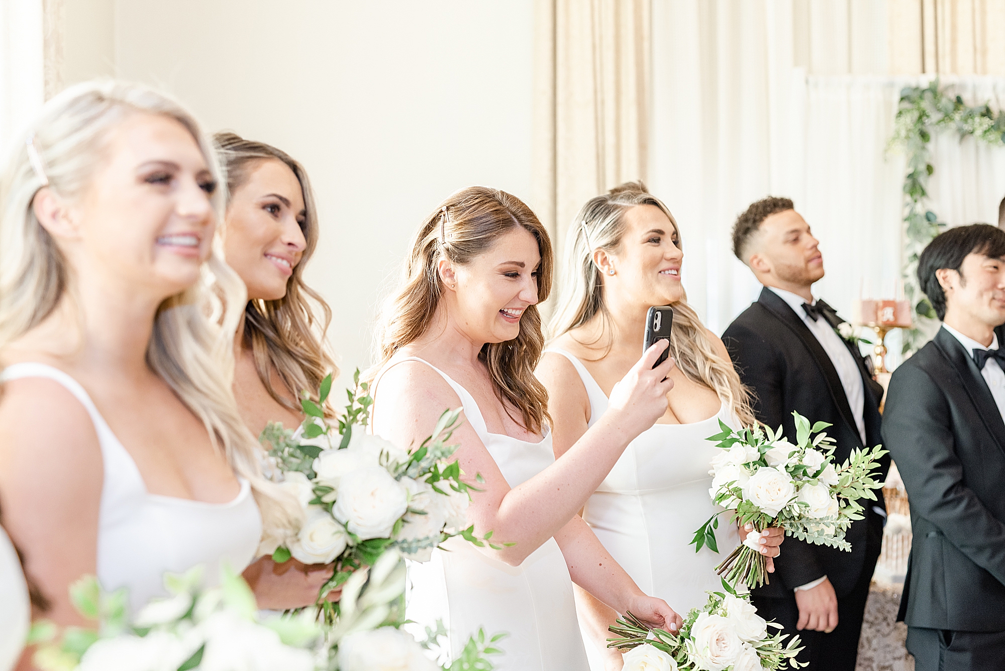 bridesmaids smile during first dance